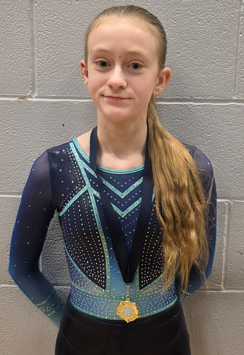 Rebecca with her trampolining medal