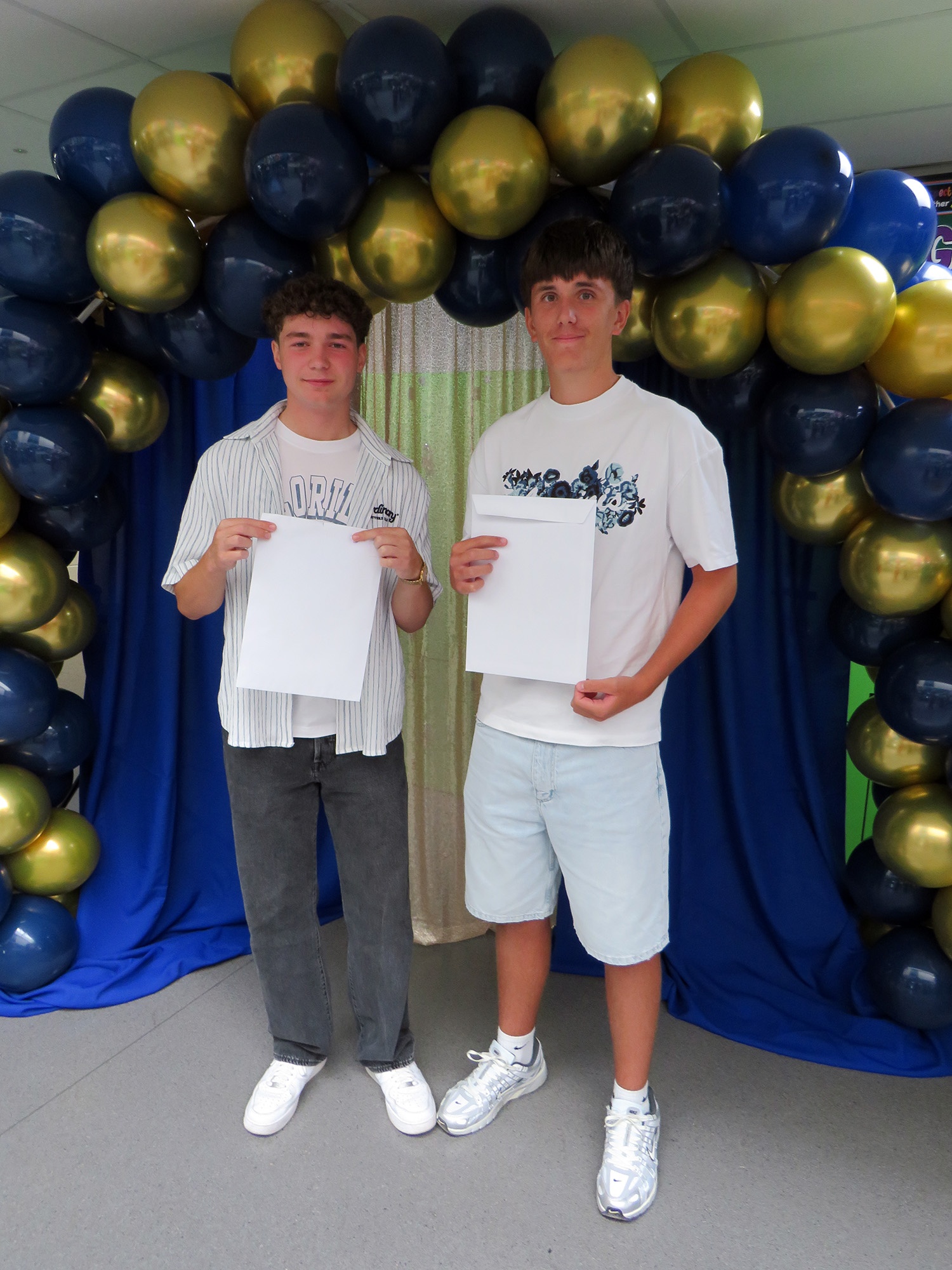 Two Westfield students celebrating their GCSE results